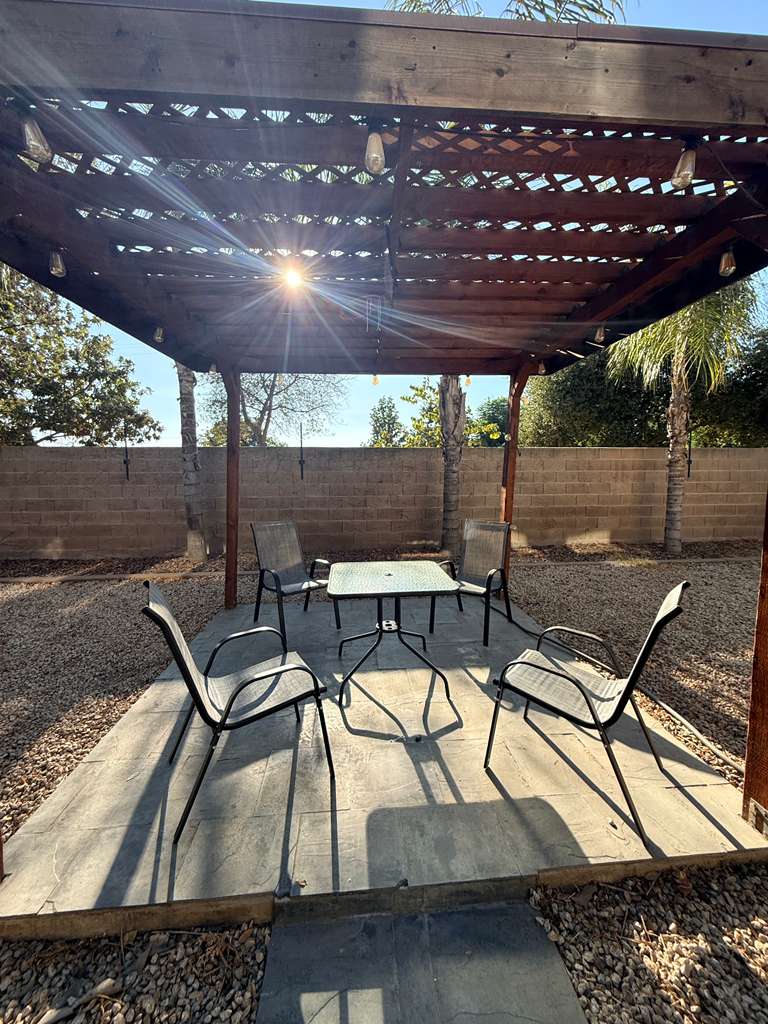 Backyard patio with pergola
